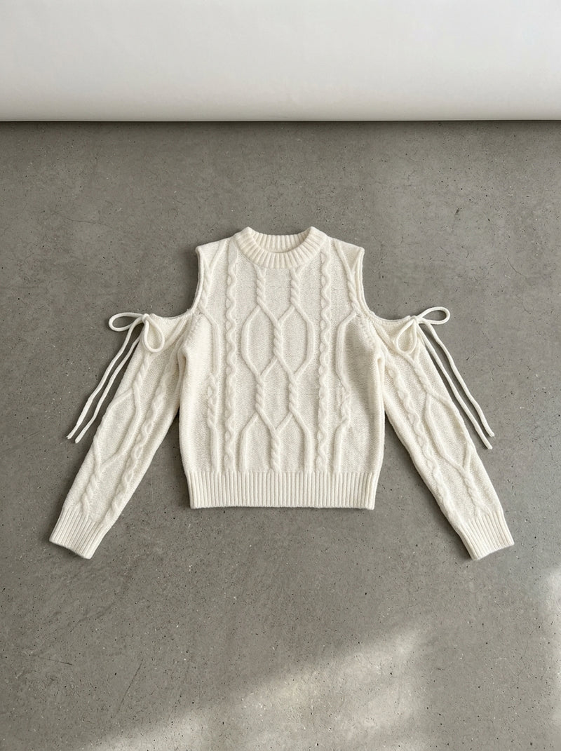 Cold Shoulder Bow Cable Knit Sweater in off white
