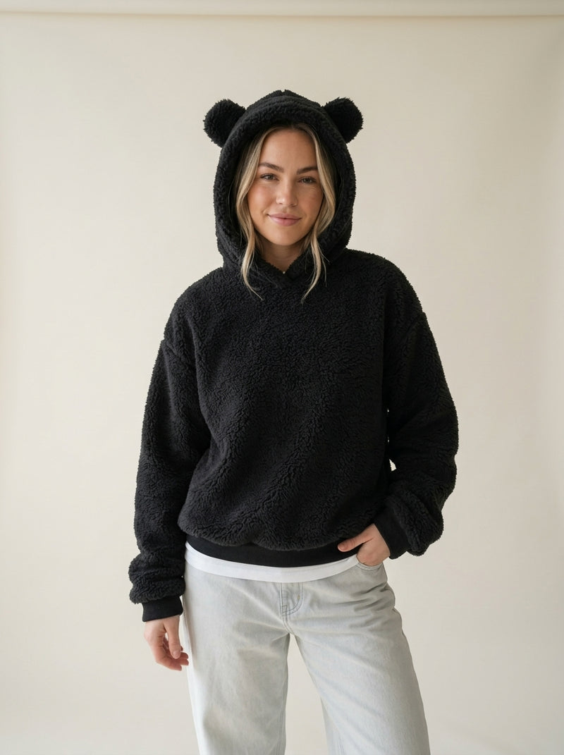 Cosy Hooded Drop Shoulder Pullover Sweater in black, worn